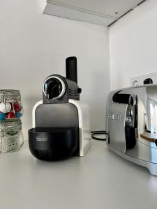 a toaster sitting on top of a kitchen counter at Weinberg-Design-Apartment Stuttgart-Fellbach in Fellbach