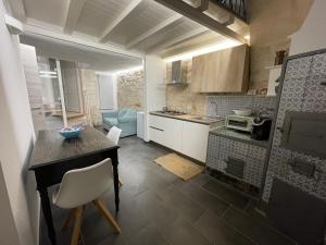 Kuchyň nebo kuchyňský kout v ubytování ponte vecchio b&b + 6 fotografií