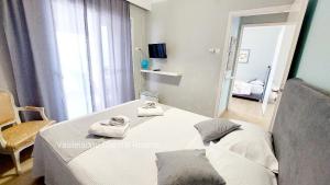 Posteľ alebo postele v izbe v ubytovaní Vasileiadou Coastal Rooms
