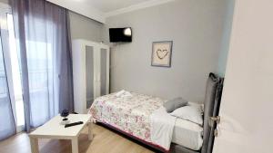 Posteľ alebo postele v izbe v ubytovaní Vasileiadou Coastal Rooms