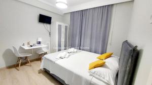 Posteľ alebo postele v izbe v ubytovaní Vasileiadou Coastal Rooms