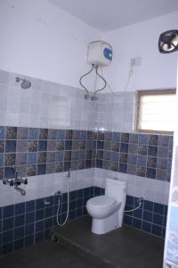 Ένα μπάνιο στο CHETAN INN HOTEL
