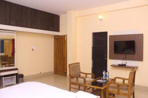 Μια τηλεόραση ή/και κέντρο ψυχαγωγίας στο CHETAN INN HOTEL