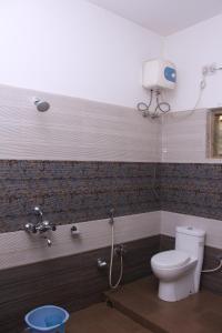 Ένα μπάνιο στο CHETAN INN HOTEL
