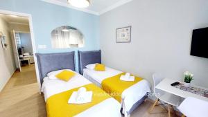 Posteľ alebo postele v izbe v ubytovaní Vasileiadou Coastal Rooms