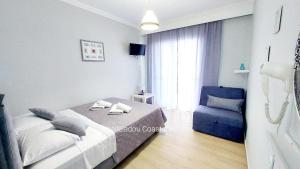 Posteľ alebo postele v izbe v ubytovaní Vasileiadou Coastal Rooms