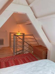 Posteľ alebo postele v izbe v ubytovaní KER MAJA : Charmante Maison 1930 * Jardin * 2 vélos * WIFI