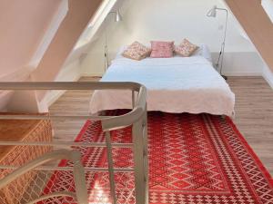 Posteľ alebo postele v izbe v ubytovaní KER MAJA : Charmante Maison 1930 * Jardin * 2 vélos * WIFI
