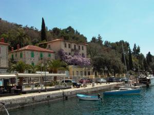 a group of boats in the water near a marina at Beautiful seaside 2 bedroom apartment Babina in Rabac