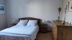 Ένα ή περισσότερα κρεβάτια σε δωμάτιο στο Chambre et petit déjeuner