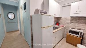 Kuchyňa alebo kuchynka v ubytovaní Vasileiadou Coastal Rooms