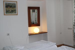 Ένα ή περισσότερα κρεβάτια σε δωμάτιο στο JR's House