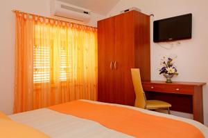 Postel nebo postele na pokoji v ubytování Guest House Kod Peskarije