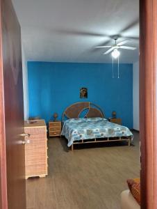 Ein Bett oder Betten in einem Zimmer der Unterkunft Villa sovareto