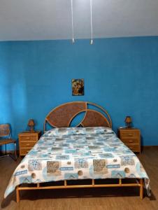 En eller flere senge i et værelse på Villa sovareto