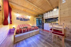 Kuchyň nebo kuchyňský kout v ubytování AL RANCH WELLNESS CADORE DOLOMITI APARTMENTS vicino Cortina Olimpiadi 2026 e Misurina Tre Cime Lavaredo