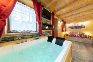 Fotografie z fotogalerie ubytování AL RANCH WELLNESS CADORE DOLOMITI APARTMENTS vicino Cortina Olimpiadi 2026 e Misurina Tre Cime Lavaredo v destinaci Pieve di Cadore