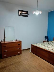 Ένα ή περισσότερα κρεβάτια σε δωμάτιο στο Villa sovareto