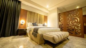 Letto o letti in una camera di Tranquila Hotels and Suites Abuja