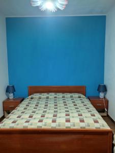 Een bed of bedden in een kamer bij Villa sovareto