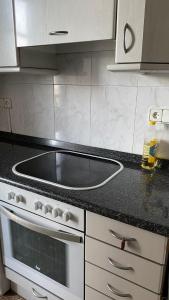 Kuchyň nebo kuchyňský kout v ubytování Hostel Santander + 11 fotografií