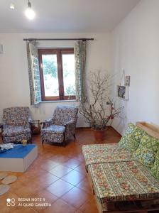 Posezení v ubytování Sunset Cottage