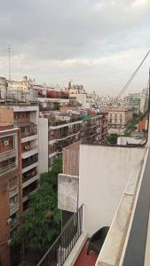 a view of a city from the balcony of a building at Departamento en Recoleta con Balcon Terraza in Buenos Aires