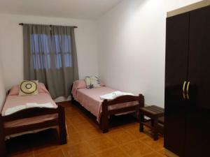 Giường trong phòng chung tại Departamento Fuerza y Fe alquiler temporario