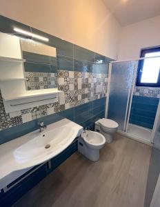 A bathroom at NaturAmare Apartments Palinuro