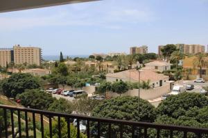 a view of a city from a balcony at apartamento vista al mar piscina playa 3 min in Aguadulce