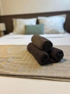 Letto o letti in una camera di Le Ti Dauphin plage Anse a L'âne