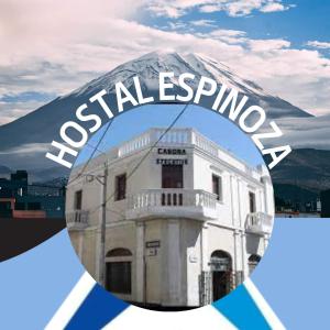 una imagen de un edificio con una montaña en el fondo en HOSTAL espinoza, en Arequipa