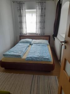 Voodi või voodid majutusasutuse Nyugalom Szigete toas