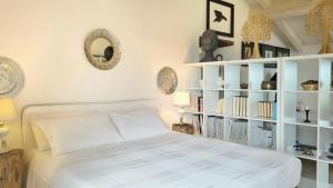 A bed or beds in a room at Agriturismo Podere Le Palaie