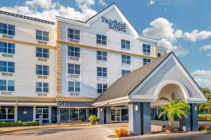 a rendering of the exterior of a hotel at Fairfield Inn & Suites by Marriott Orlando Lake Buena Vista in Orlando