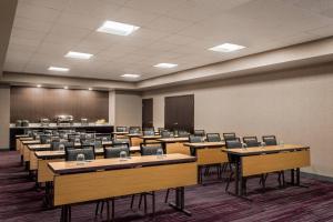 a classroom with rows of tables and chairs at Courtyard by Marriott San Jose South/Morgan Hill in Morgan Hill