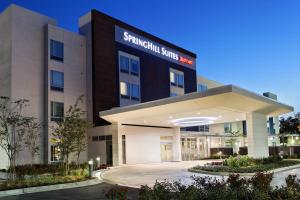 a rendering of the entrance to the springhill clinic building at SpringHill Suites by Marriott Pensacola in Pensacola