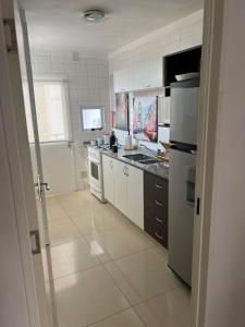 Una cocina o kitchenette en PALERMO APART