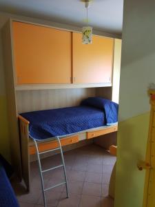 Postel nebo postele na pokoji v ubytování Casa vacanza Tommy