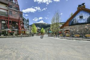 a cobblestone street in a town with buildings at Jack Pine 8016 in Keystone