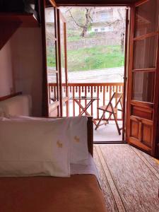 Voodi või voodid majutusasutuse HOTEL MARI Metsovo toas
