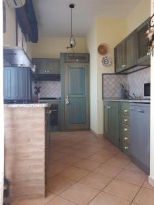 Kuchyň nebo kuchyňský kout v ubytování Casa vacanza Tommy