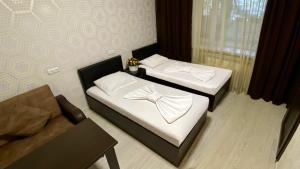 Postel nebo postele na pokoji v ubytování Merien Guesthouse 16