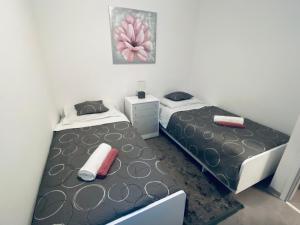 En eller flere senge i et værelse på Apartman Stipančić