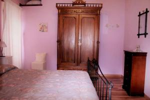 Postel nebo postele na pokoji v ubytování Casa Coccinella Valdieri