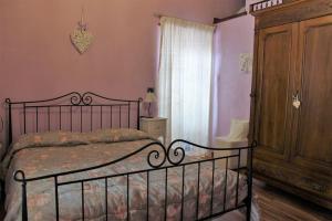 Postel nebo postele na pokoji v ubytování Casa Coccinella Valdieri