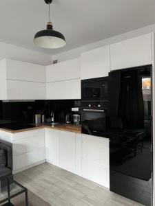 Kuchyňa alebo kuchynka v ubytovaní Apartament Księcia Janusza
