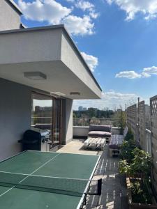 Tenis alebo squash v ubytovaní Apartament Księcia Janusza alebo jeho okolí