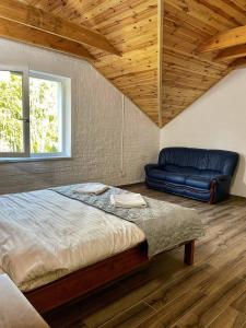 Postel nebo postele na pokoji v ubytování Садиба Бабина Лоза