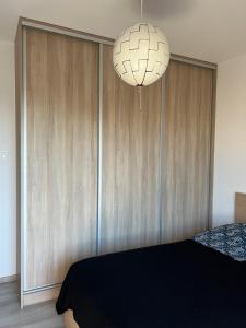 Posteľ alebo postele v izbe v ubytovaní Apartament Księcia Janusza